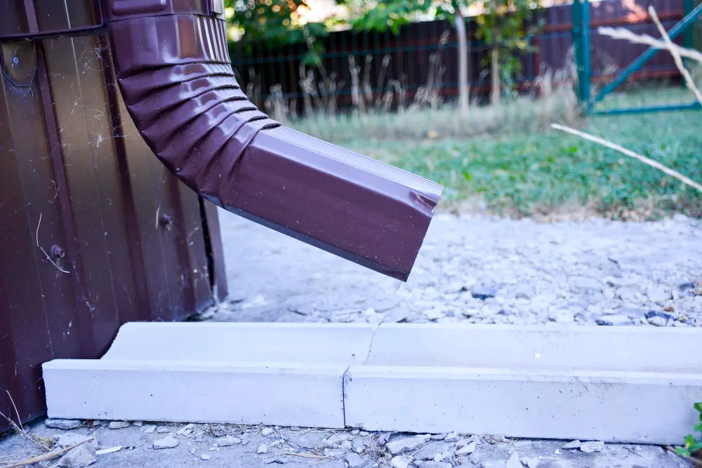 How to Build a Gravel Trench or Swale for Downspout Runoff