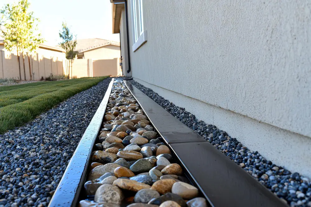 How to Redirect Gutter Water Away from Gravel Driveways